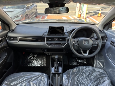 WR-V(ホンダ)登録済未使用車 後席から見た前席