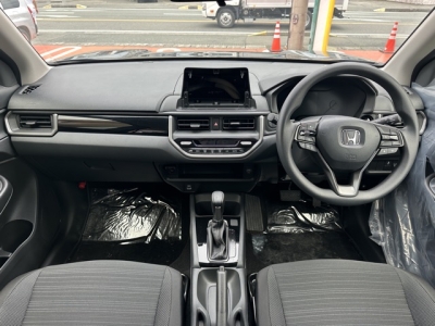 WR-V(ホンダ)登録済未使用車 後席から見た前席