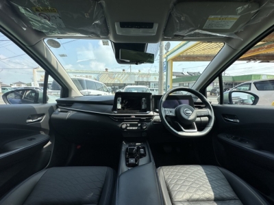ノート(ニッサン)中古車 後席から見た前席
