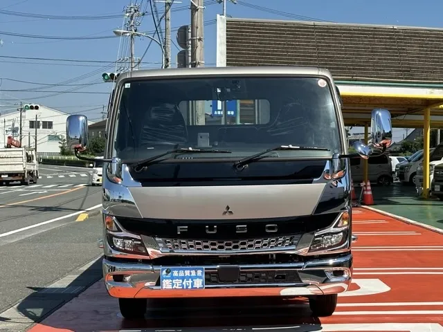 キャンター(三菱)平ボディ 2ｔワイドロング MT 1ナンバー車登録済未使用車 29